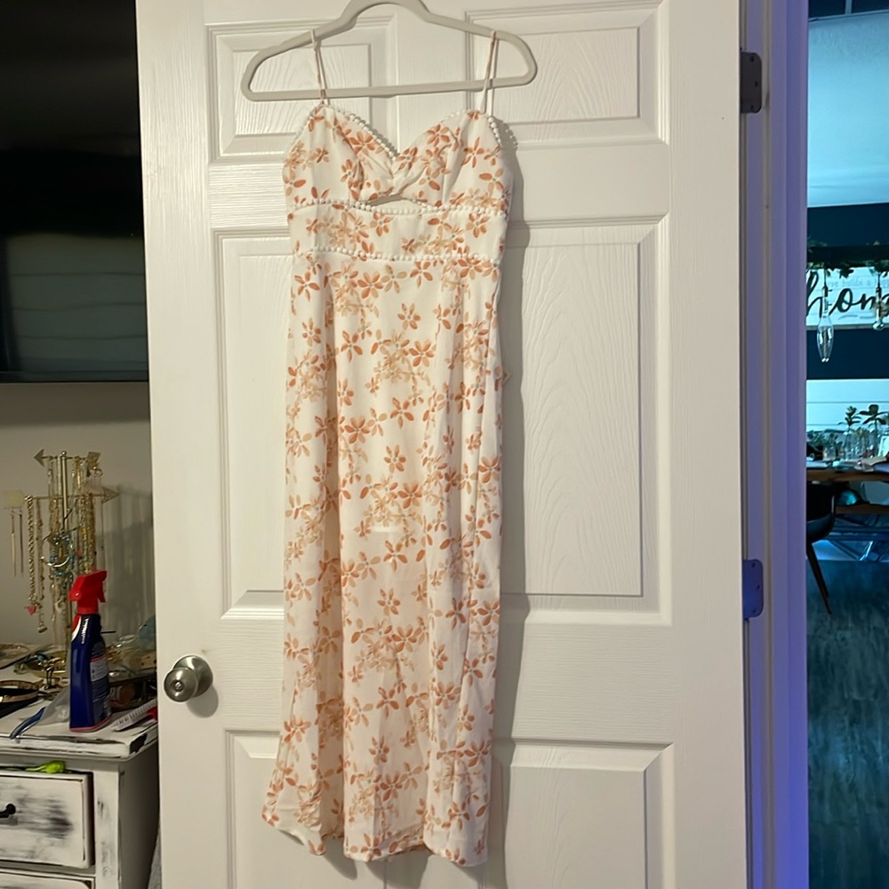 floral peachy midi dress with cutout detail on bodice and side slit